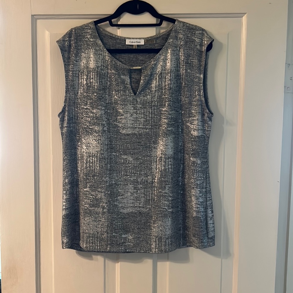 Calvin Klein size extra-large, silver top